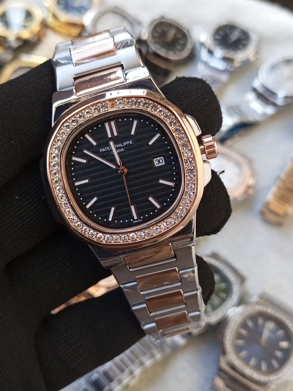 Patek Philippe Nautilus Men’s Watch with Stone Bezel