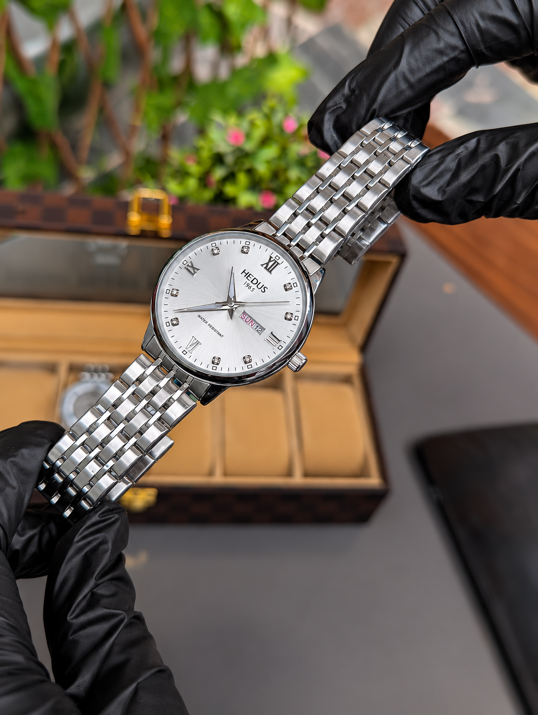 HEDUS Brand Stainless Steel  Waterproof Watch with Skeleton Back & Day-Date Display