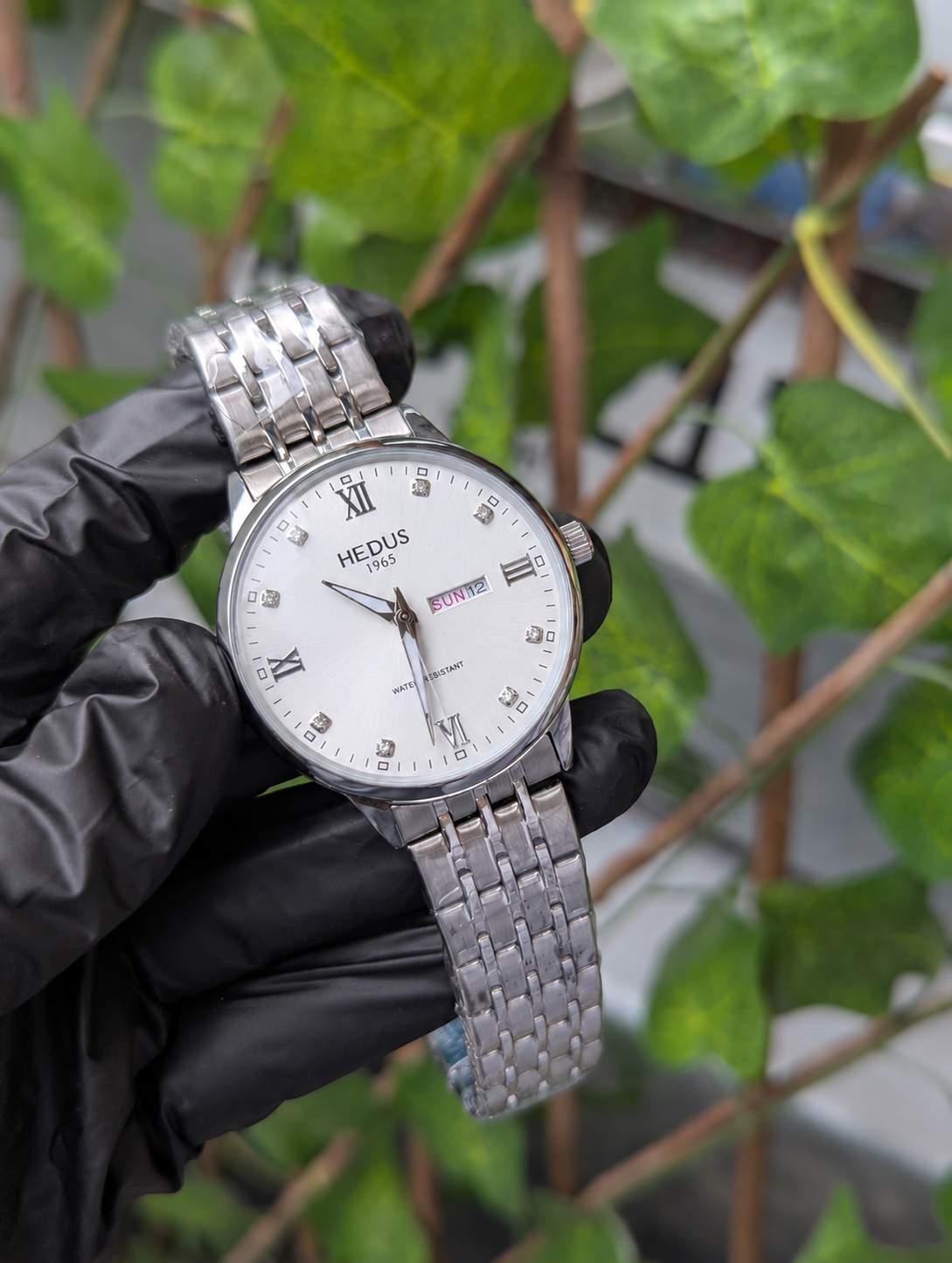 HEDUS Brand Stainless Steel  Waterproof Watch with Skeleton Back & Day-Date Display