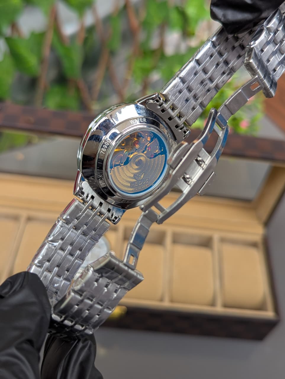 HEDUS Brand Stainless Steel  Waterproof Watch with Skeleton Back & Day-Date Display