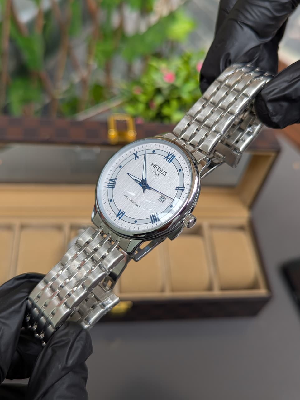 HEDUS Brand Stainless Steel  Waterproof Watch with Skeleton Back & Day-Date Display